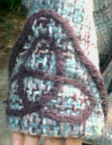 Close-up of Celtic knot on one of the sleeves